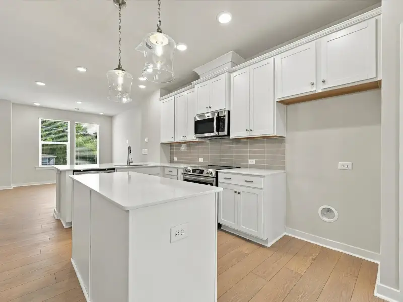 Furnished interior view inside a new home in Central Living at Craig, Charlotte (Image 8).