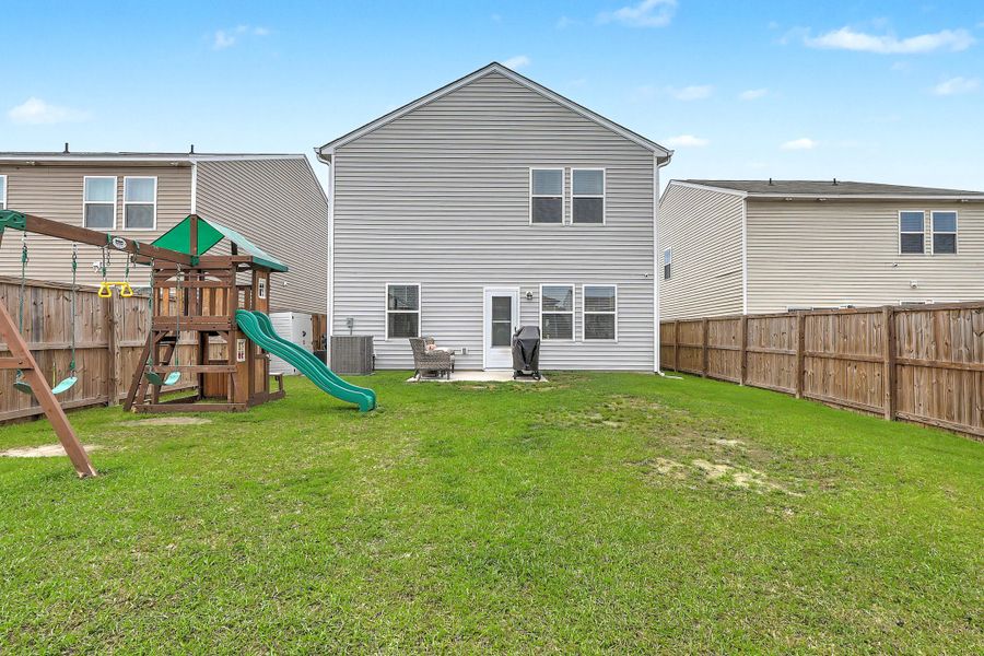 Exterior details and patio area of a home in Watson Hill, Summerville (Image 25).