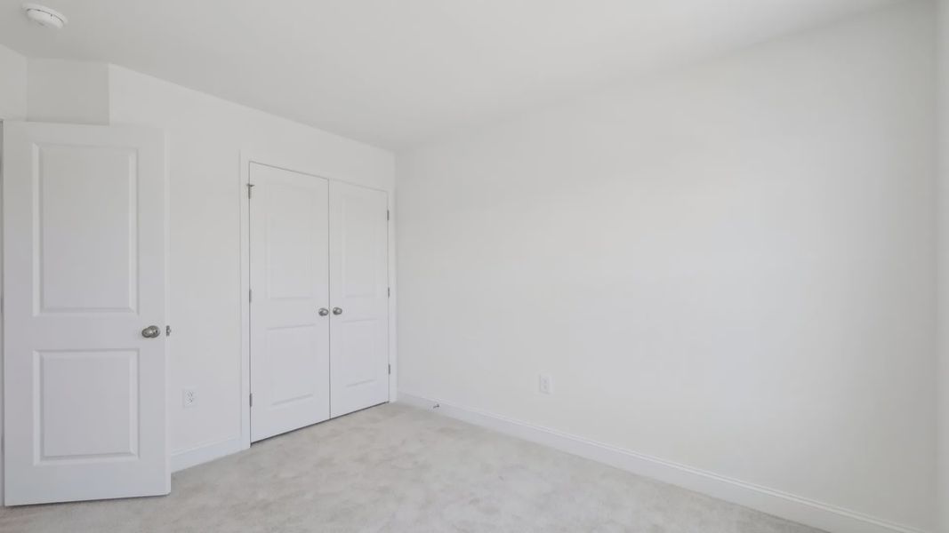 Furnished interior view inside a new home in Sidney Creek Single Family, Zebulon (Image 24).