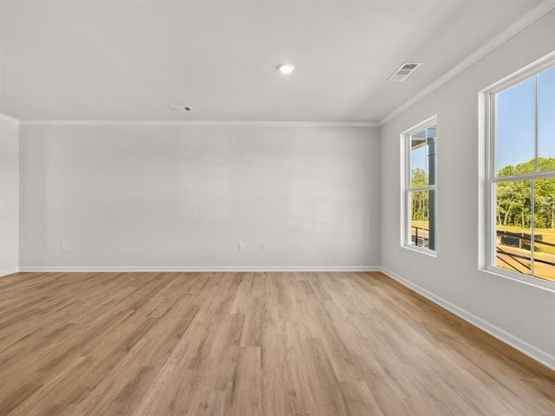 Spacious, unfurnished interior of a new home in Waypoint, Flowery Branch (Image 22).