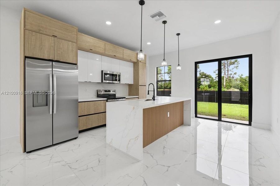 Furnished interior view inside a new home in , Lehigh Acres (Image 16).