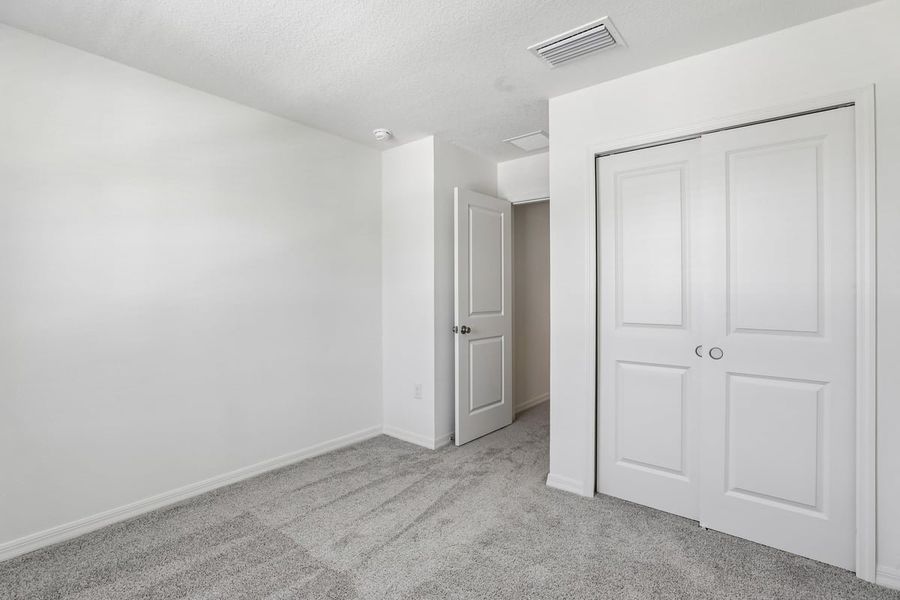 Spacious, unfurnished interior of a new home in Reserve at Forest Lake Townhomes, Lake Wales (Image 18).