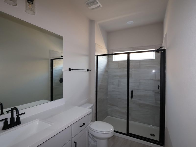 Furnished interior view inside a new home in Edgewood, Leander (Image 15). Furnished interior view inside a new home in Edgewood, Leander (Image 15).