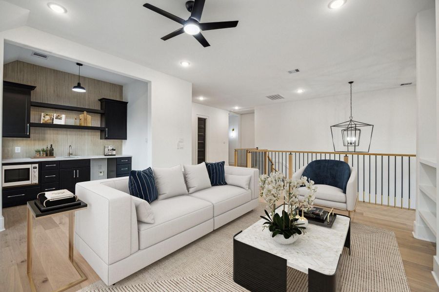 Huge game room with wet bar including microwave and mini fridge Huge game room with wet bar including microwave and mini fridge