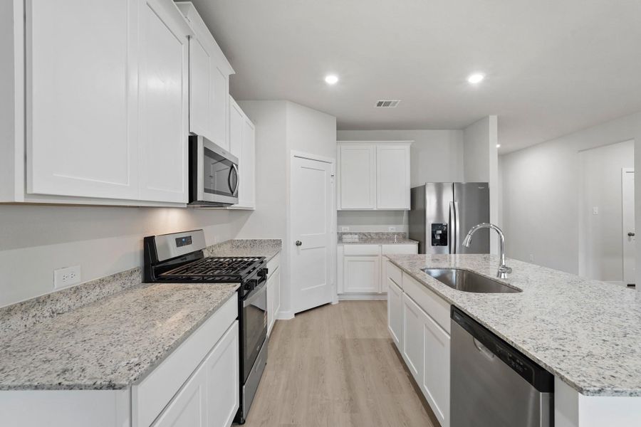Furnished interior view inside a new home in Lexington Heights, Willis (Image 11). Furnished interior view inside a new home in Lexington Heights, Willis (Image 11).