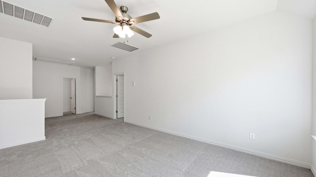 Furnished interior view inside a new home in Oaks at San Gabriel, Georgetown (Image 13).
