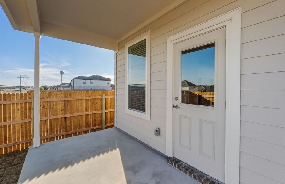 Exterior details and patio area of a home in Crosswinds, Kyle (Image 23).