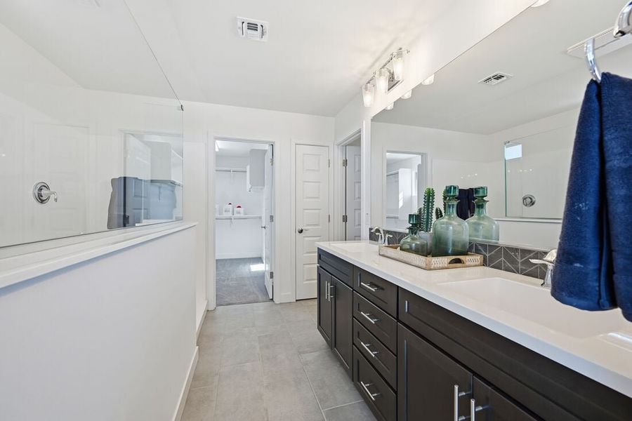 Furnished interior view inside a new home in La Mira, Mesa (Image 16).