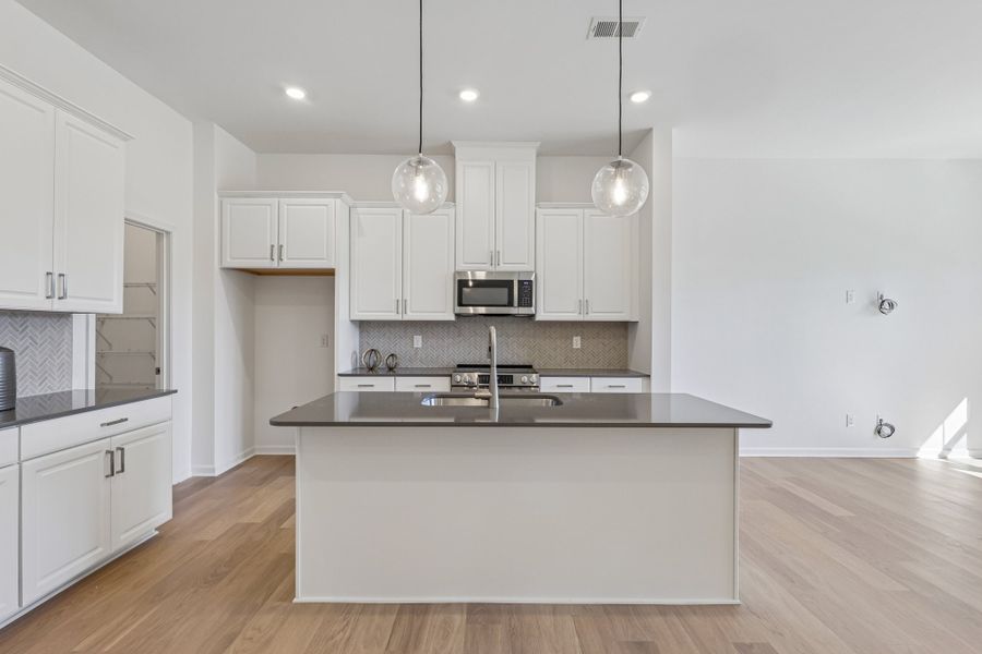 Furnished interior view inside a new home in Terraces at the Exchange, Fort Mill (Image 4).