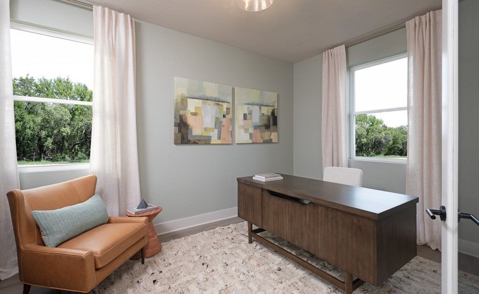 Representative furnished interior of a home built from the Colton by Ashton Woods in Covered Bridge, Hutto (Image 5).