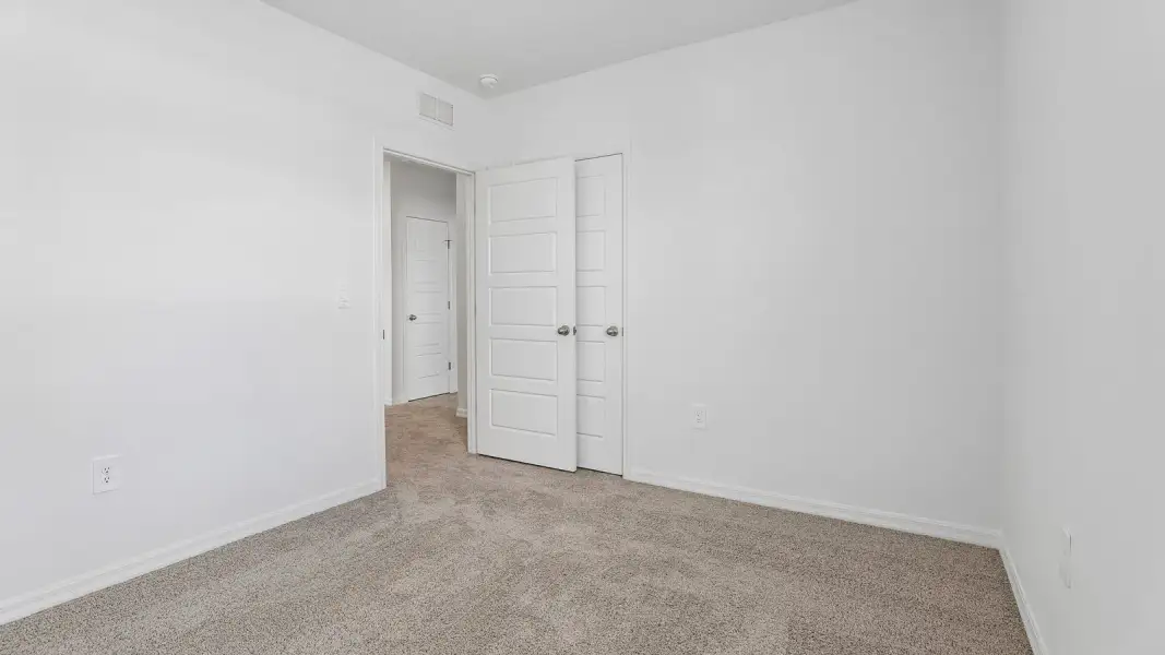 Representative unfurnished interior of a home built from the Crestview by D.R. Horton in Hawthorne Ranch, Lakeland (Image 26).