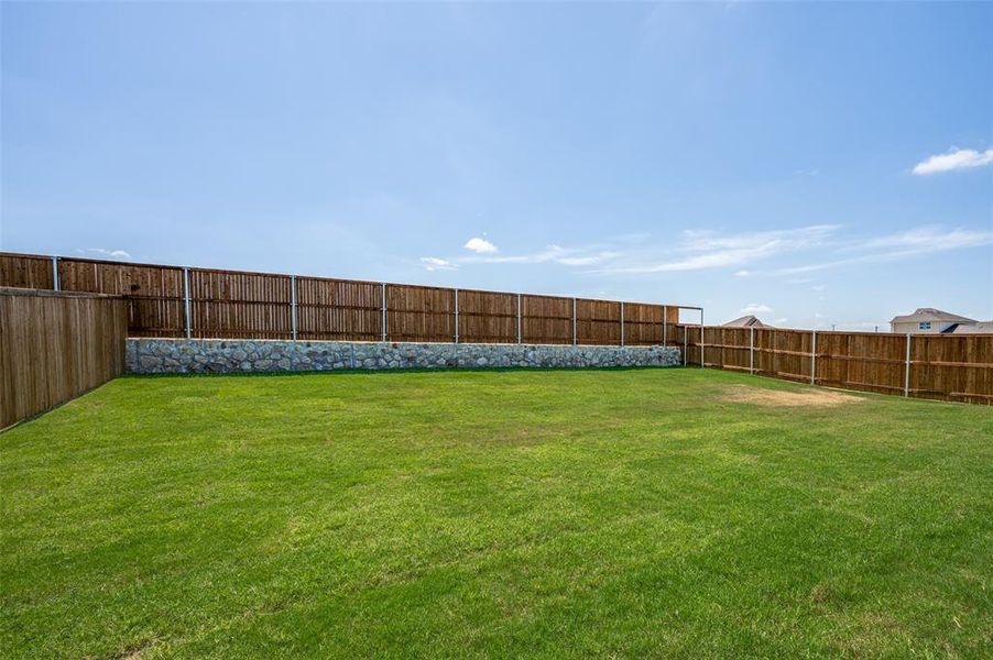 Front exterior of a new home in Sierra Vista at Kelly Ranch, Aledo, TX, highlighting curb appeal (Image 13). Front exterior of a new home in Sierra Vista at Kelly Ranch, Aledo, TX, highlighting curb appeal (Image 13).