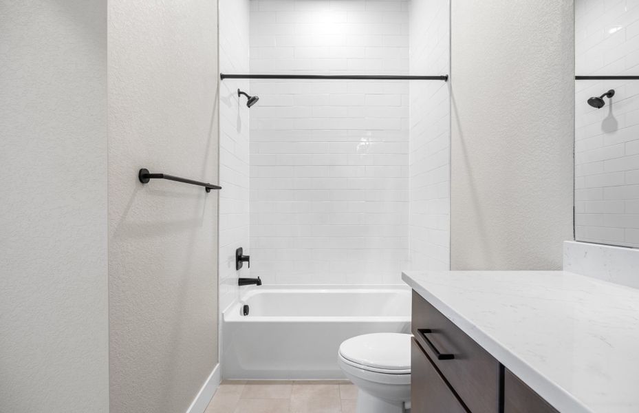 Furnished interior view inside a new home in Hilltop at Inspiration, Aurora (Image 12).