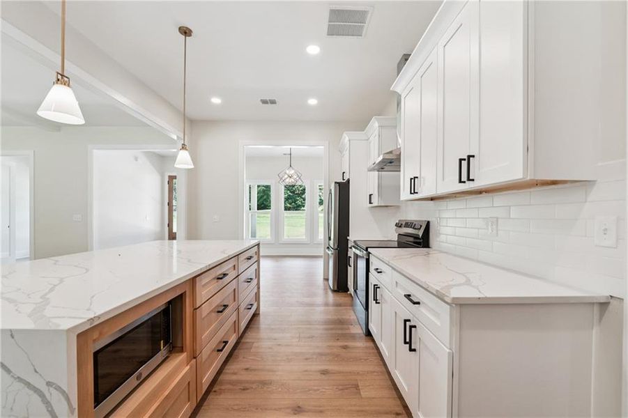 Furnished interior view inside a new home in , Monroe (Image 8). Furnished interior view inside a new home in , Monroe (Image 8).