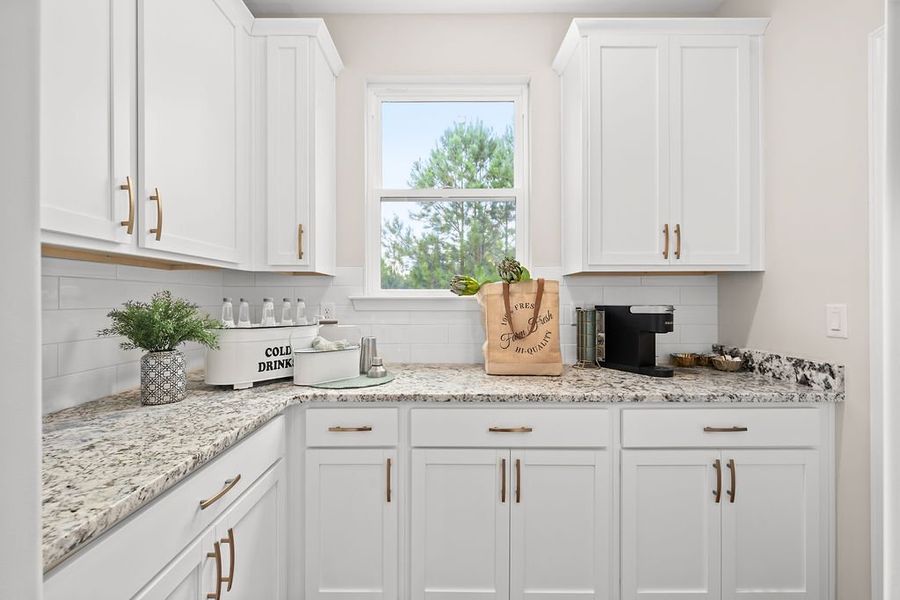 Representative furnished interior of a home built from the The Wilmington by Smith Family Homes in Savannah Highlands, Savannah (Image 11).