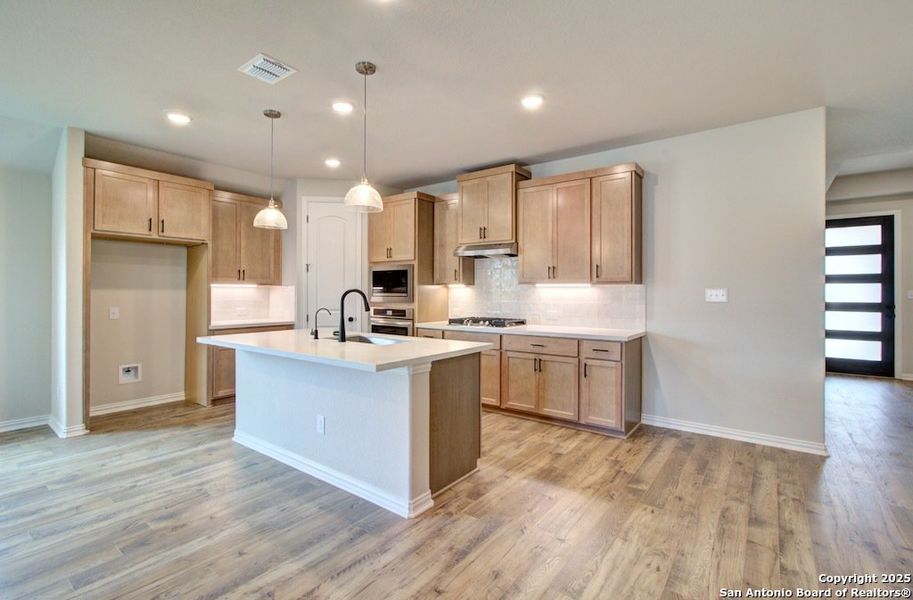 Furnished interior view inside a new home in Prairie Green, Converse (Image 4). Furnished interior view inside a new home in Prairie Green, Converse (Image 4).