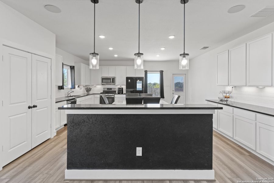 Furnished interior view inside a new home in Hickory Ridge, Elmendorf (Image 11).