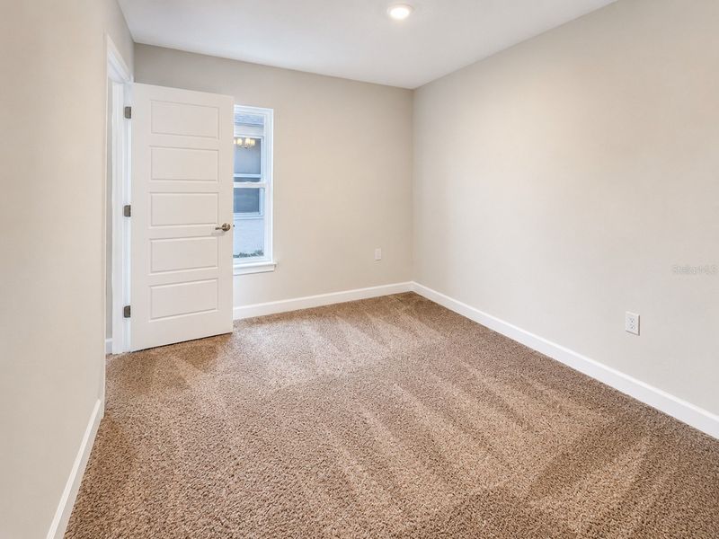 Spacious, unfurnished interior of a new home in Harmony Central, St. Cloud (Image 12).