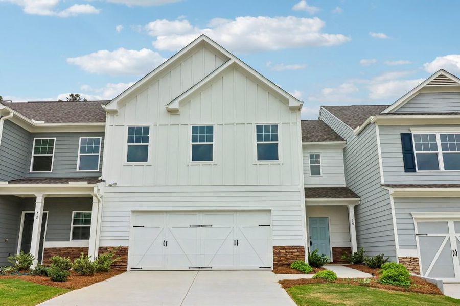 Front exterior of a new home in The Retreat at Browns Ridge, Newnan, GA, highlighting curb appeal (Image 2).