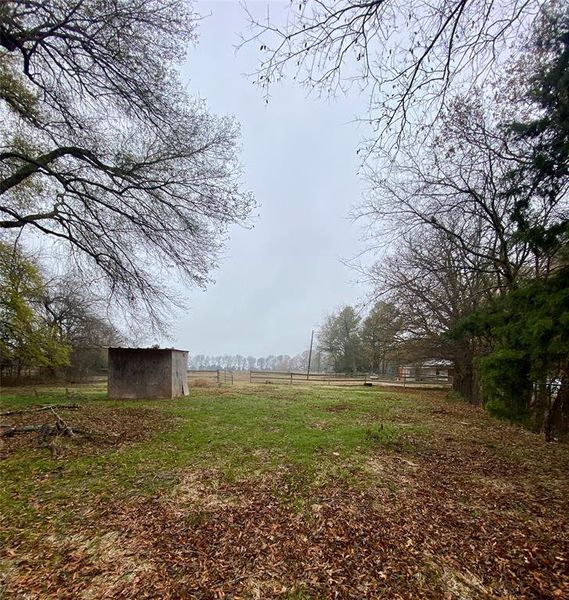 Horse shelter in smaller gated area Horse shelter in smaller gated area