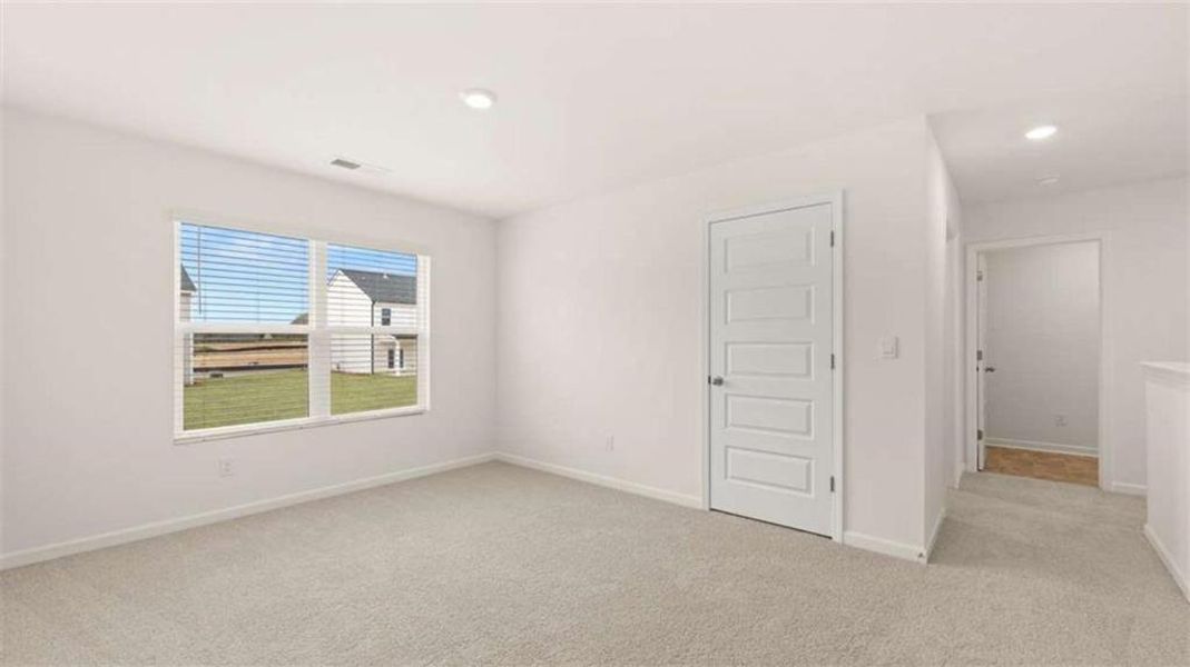 Spacious, unfurnished interior of a new home in Preserve at Dove Creek, Statham (Image 29). Spacious, unfurnished interior of a new home in Preserve at Dove Creek, Statham (Image 29).