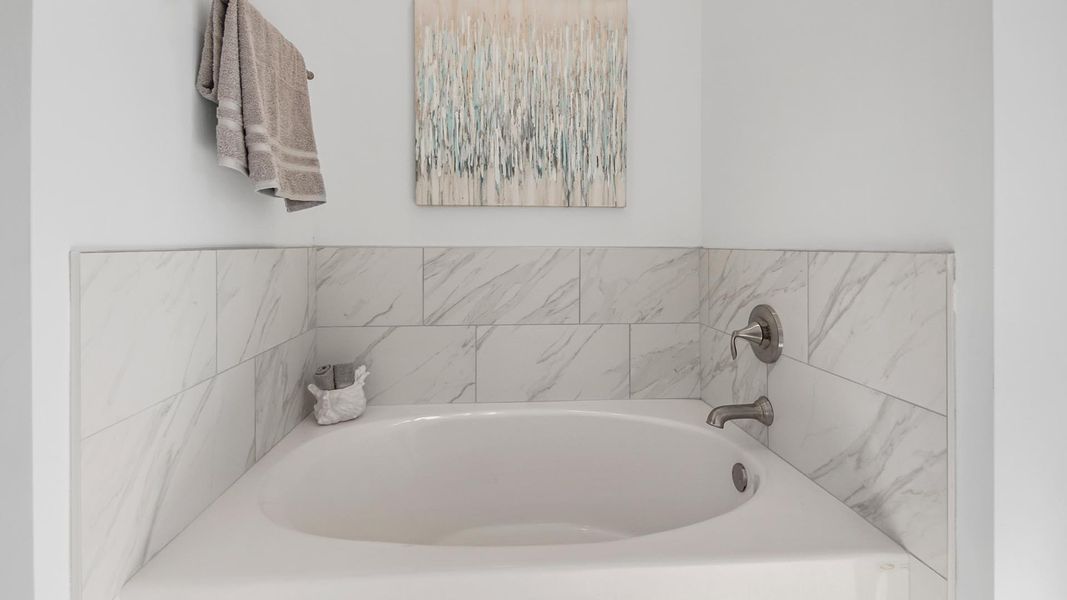 Representative furnished interior of a home built from the Jubilee by D.R. Horton in Breakfast Point East Phase II, Panama City Beach (Image 29).