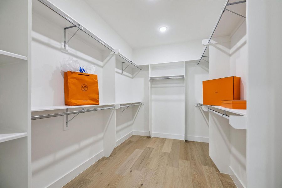 Every primary bedroom includes a spacious walk-in closet.