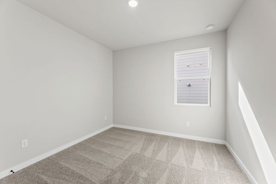 Representative unfurnished interior of a home built from the Tularosa by Hakes Brothers in Hickory Ridge, Elmendorf (Image 21).