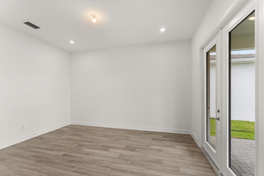 Spacious, unfurnished interior of a new home in Tradition - Seville, Port St. Lucie (Image 8).