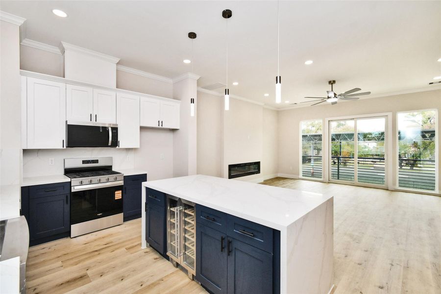 includes a built-in drink cooler in addition to range, microwave, and dish washer includes a built-in drink cooler in addition to range, microwave, and dish washer