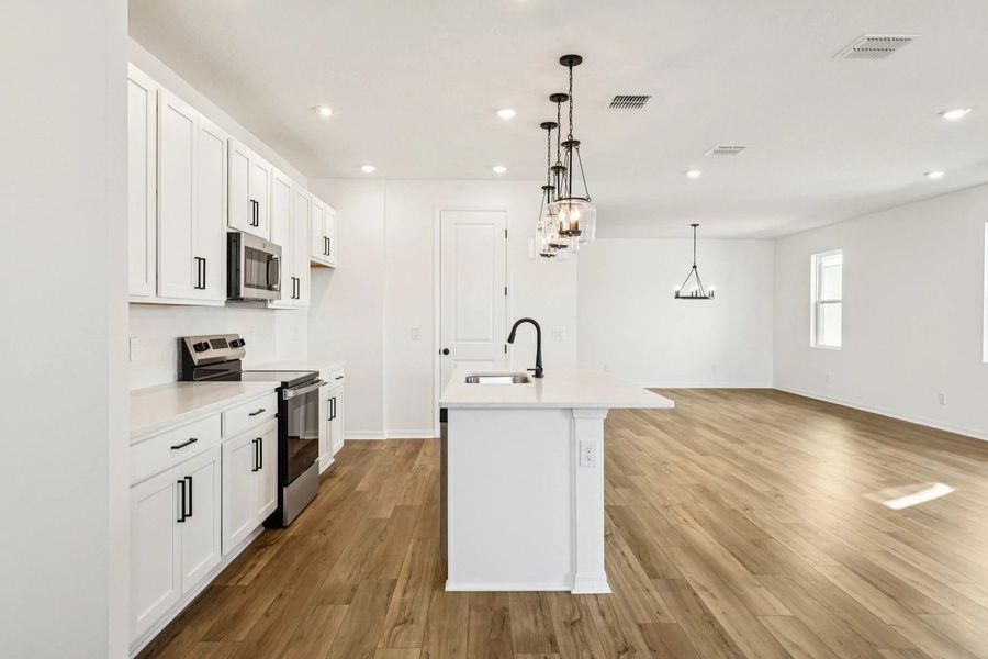 Furnished interior view inside a new home in Catamaran Cove, Rockledge (Image 4).