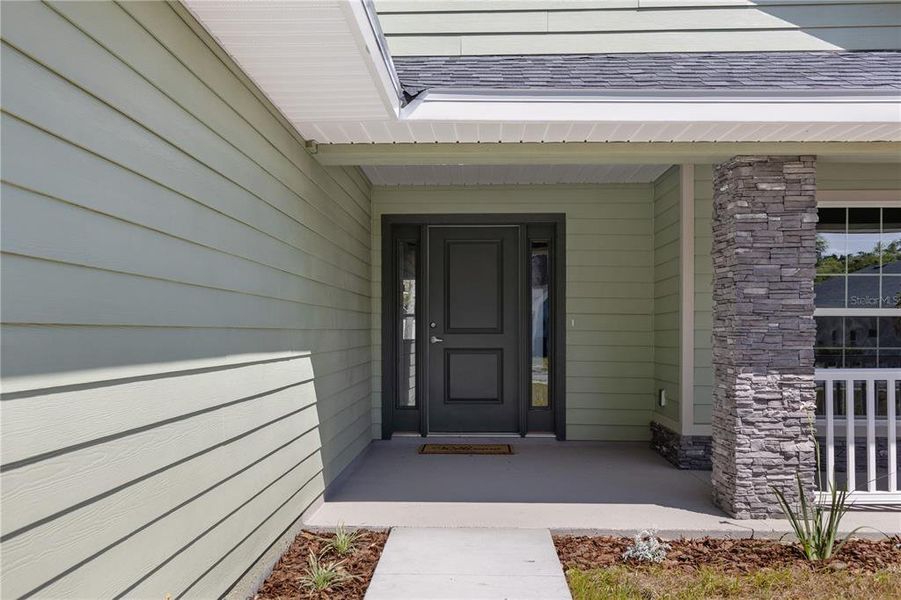 Exterior details and patio area of a home in The Preserve at Laurel Lake, Lake City (Image 16). Exterior details and patio area of a home in The Preserve at Laurel Lake, Lake City (Image 16).