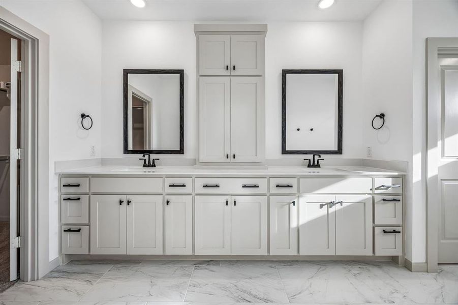 There is ample space for two in this lovely owner's bath!