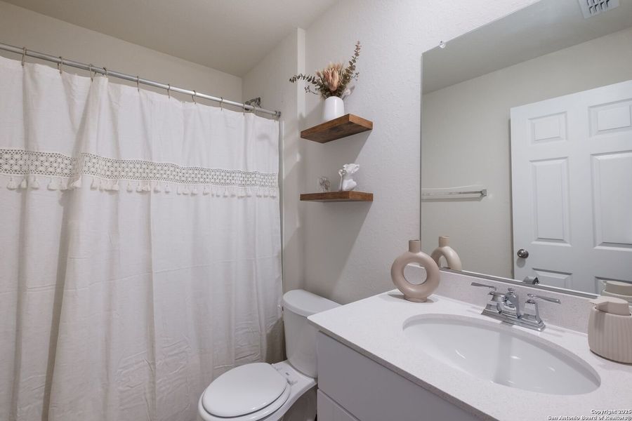 Furnished interior view inside a new home in Winding Brook, San Antonio (Image 29).