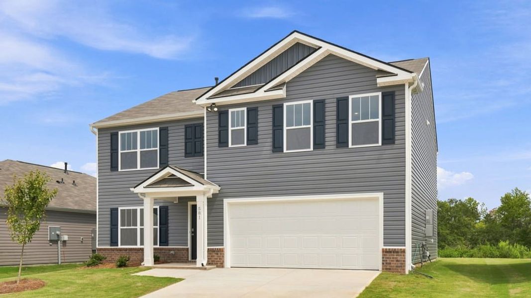 Front exterior of a new home in Lakestone, Woodruff, SC, highlighting curb appeal (Image 2). Front exterior of a new home in Lakestone, Woodruff, SC, highlighting curb appeal (Image 2).