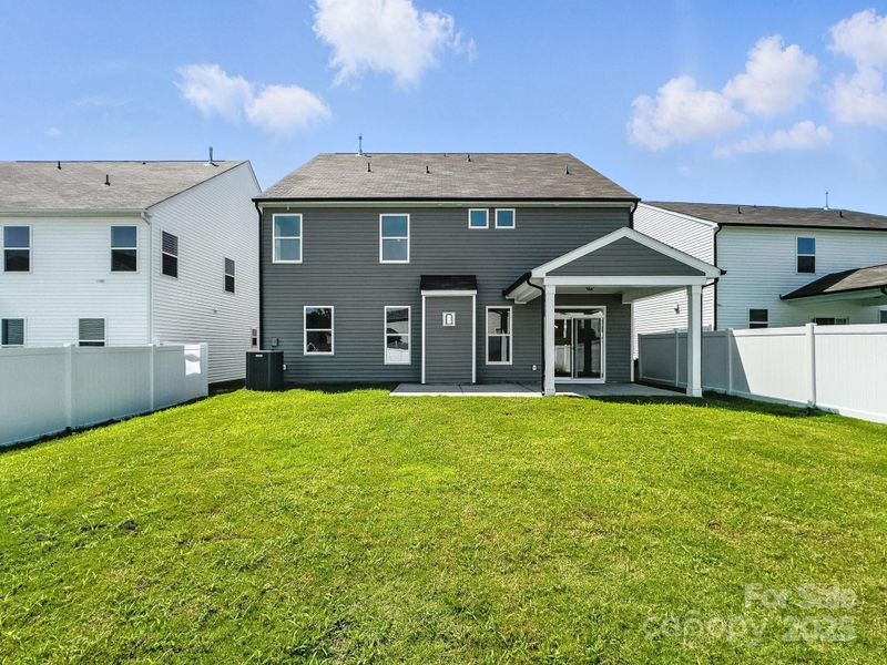 Front exterior of a new home in Hampton Woods, Charlotte, NC, highlighting curb appeal (Image 22).
