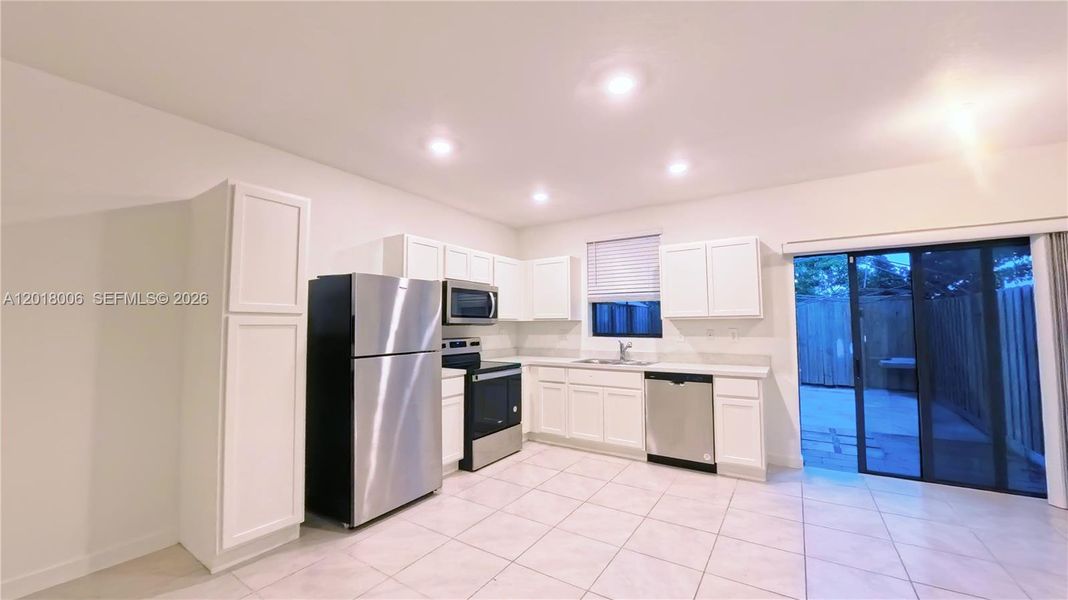 Furnished interior view inside a new home in , Florida City (Image 5).