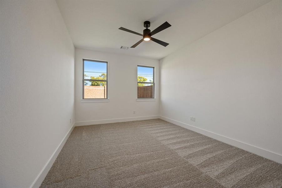 Spacious, unfurnished interior of a new home in LeTara, Haslet (Image 35).