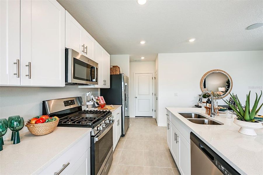 Furnished interior view inside a new home in Waterstone, Groveland (Image 26). Furnished interior view inside a new home in Waterstone, Groveland (Image 26).