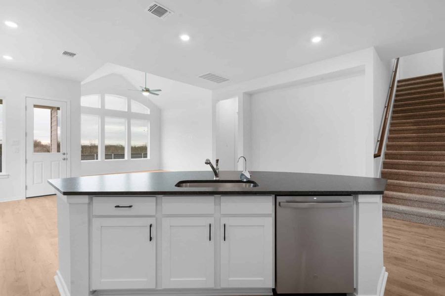 Furnished interior view inside a new home in Carillon, Manor (Image 6).