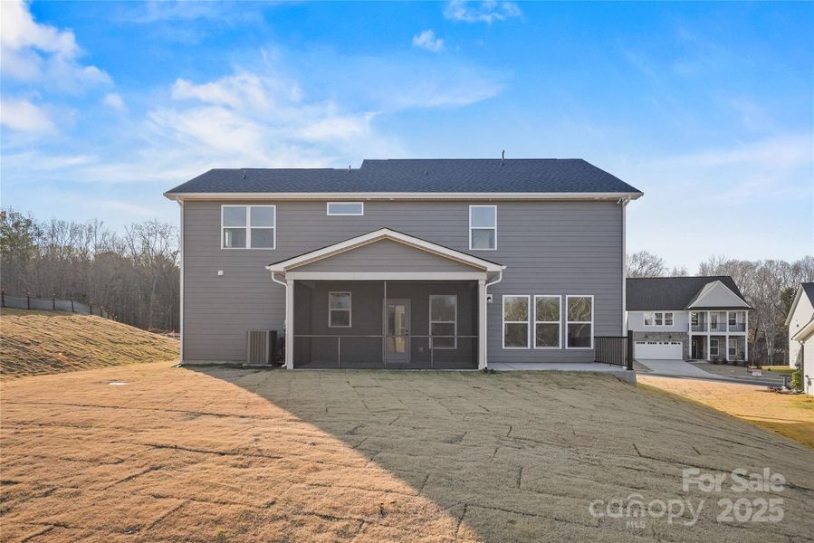 Exterior details and patio area of a home in Forest Creek, Waxhaw (Image 21).