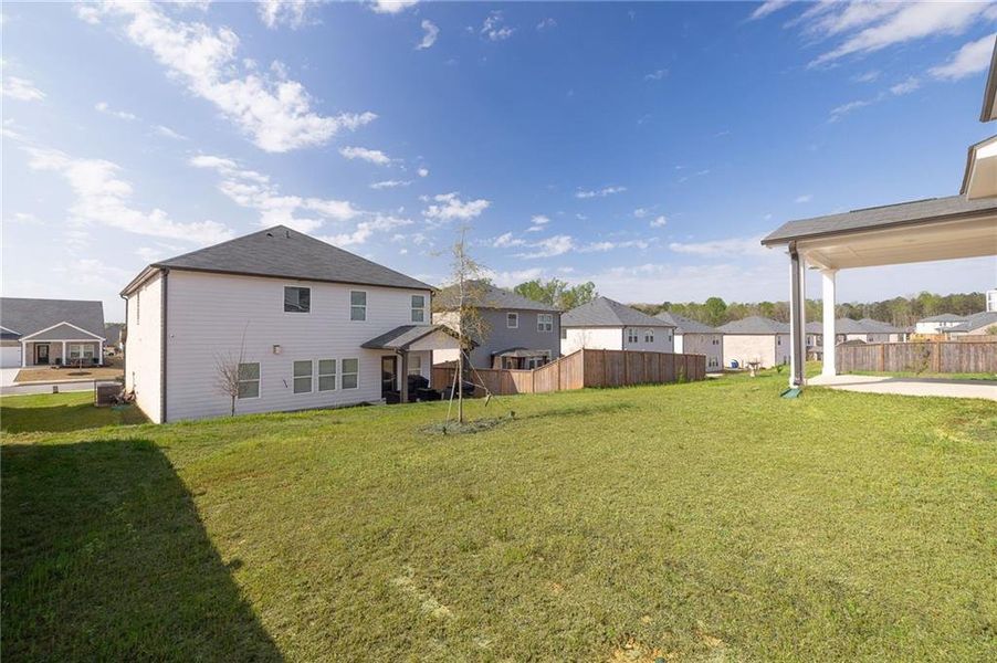 Exterior details and patio area of a home in , Fairburn (Image 24).