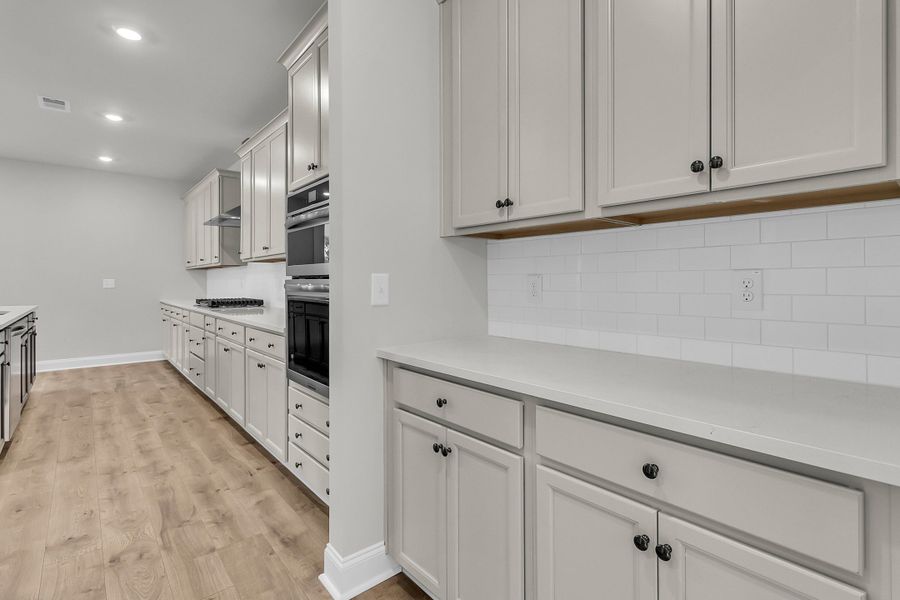 Furnished interior view inside a new home in Tidewater at Lakes of Cane Bay, Summerville (Image 7).
