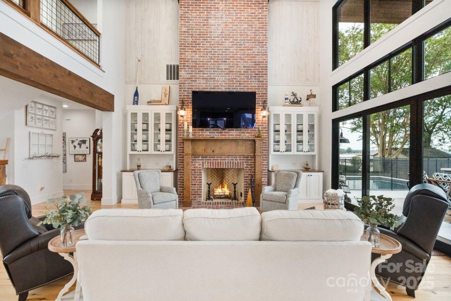 Floor to ceiling brick fireplace Floor to ceiling brick fireplace