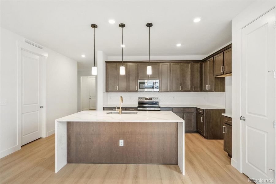 Furnished interior view inside a new home in Painted Prairie, Aurora (Image 9).