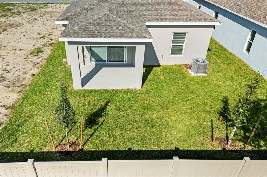 Exterior details and patio area of a home in Preservation Pointe, Davenport (Image 3).
