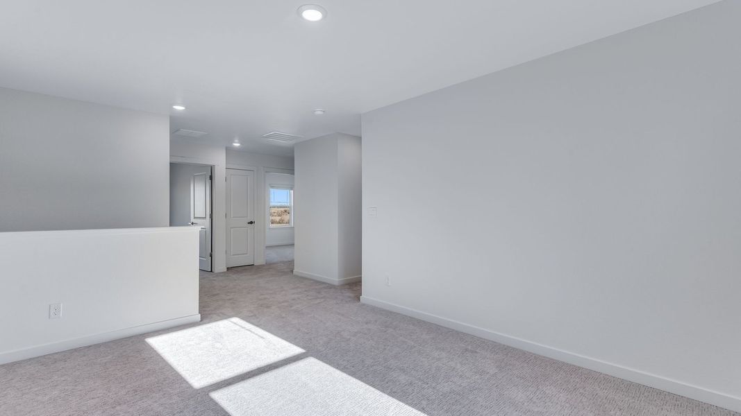 Spacious, unfurnished interior of a new home in Trails at Crowfoot, Parker (Image 15).