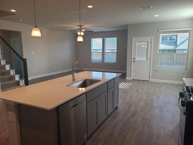 Kitchen facing Dining and Living