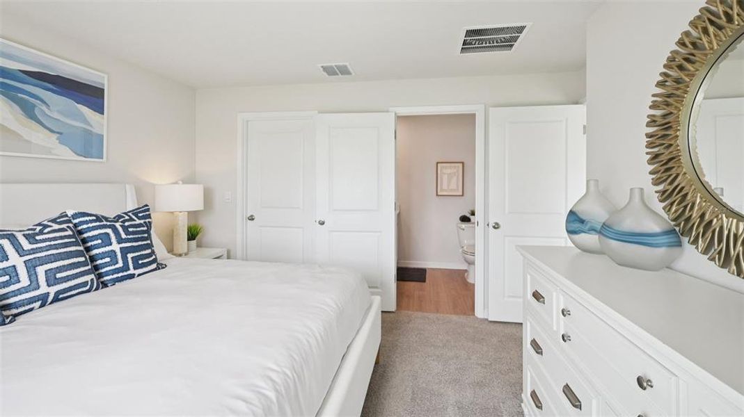 Furnished interior view inside a new home in Cove at West Port - Express, Port Charlotte (Image 18).