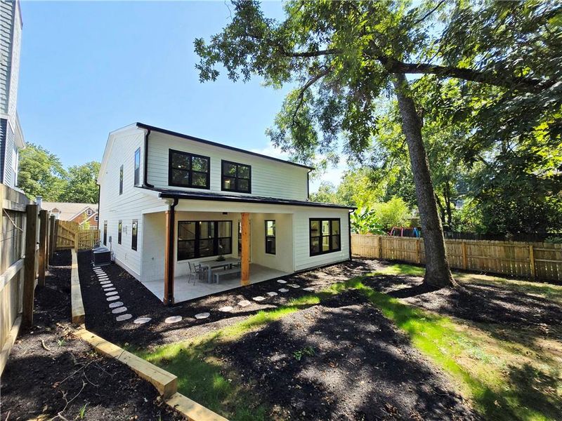 Front exterior of a new home in , Atlanta, GA, highlighting curb appeal (Image 1).